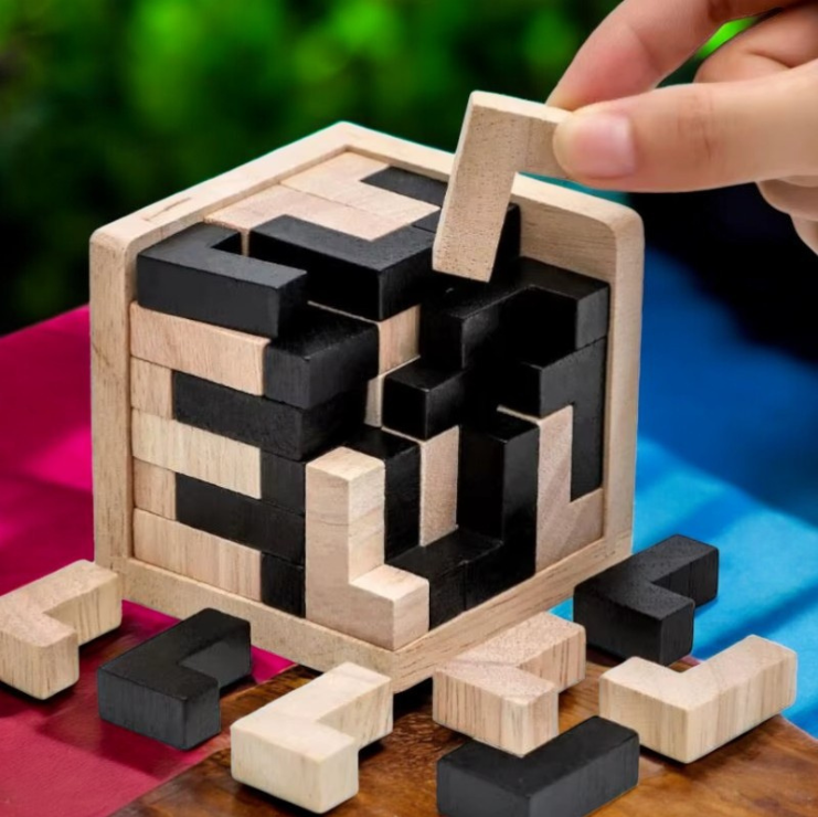 Playing Wooden 3D Cube Puzzle Game – Educational Brain Teaser